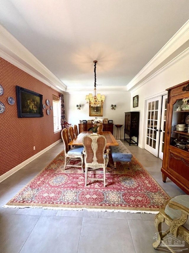 2367 Greenbrier Blvd, Pensacola, FL 32514 - dining room featuring ornamental molding, a chandelier, french doors, and baseboards