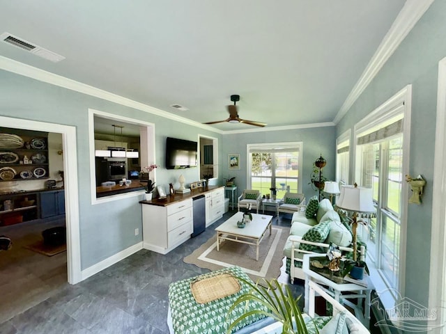 2367 Greenbrier Blvd, Pensacola, FL 32514 - living area with crown molding, ceiling fan, and baseboards