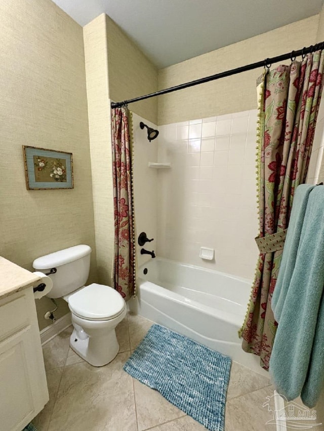 2367 Greenbrier Blvd, Pensacola, FL 32514 - bathroom featuring toilet, shower / bath combo with shower curtain, vanity, and tile patterned floors