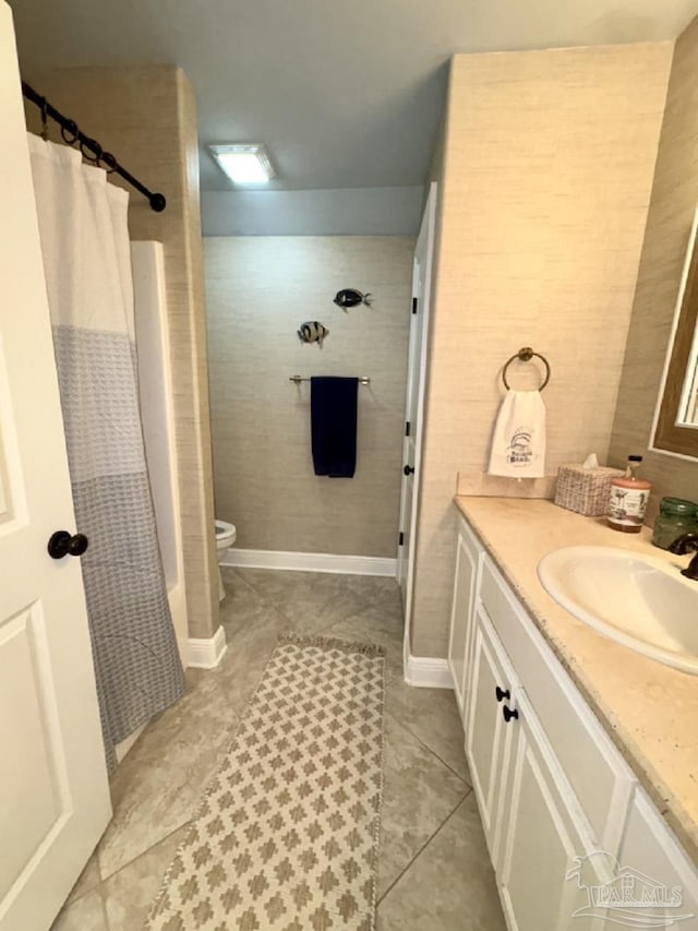 2367 Greenbrier Blvd, Pensacola, FL 32514 - full bath featuring vanity, toilet, tile patterned flooring, and curtained shower