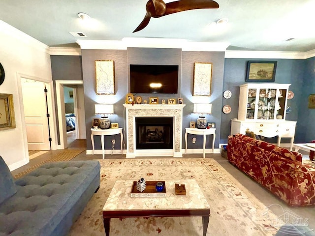 2367 Greenbrier Blvd, Pensacola, FL 32514 - living area with a ceiling fan, ornamental molding, baseboards, and a fireplace