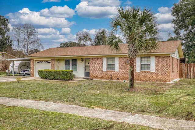 ranch-style house featuring a garage, a front yard, and a carport