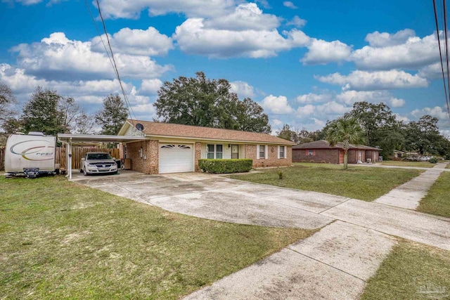 ranch-style home featuring a carport, a garage, and a front lawn