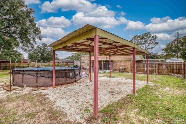 view of yard featuring a fenced in pool