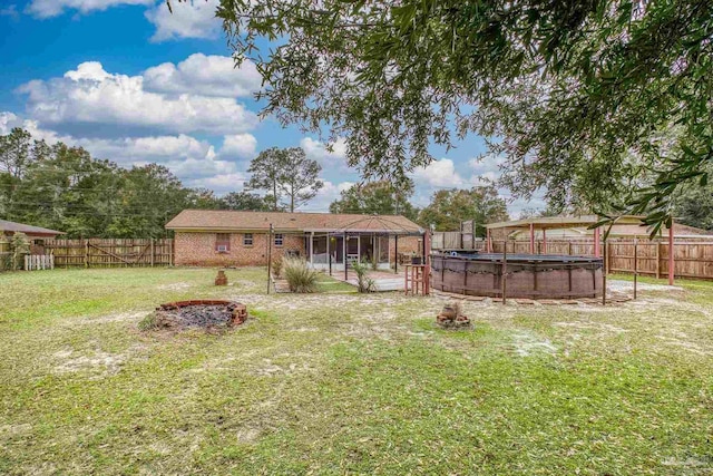 view of yard featuring a fenced in pool