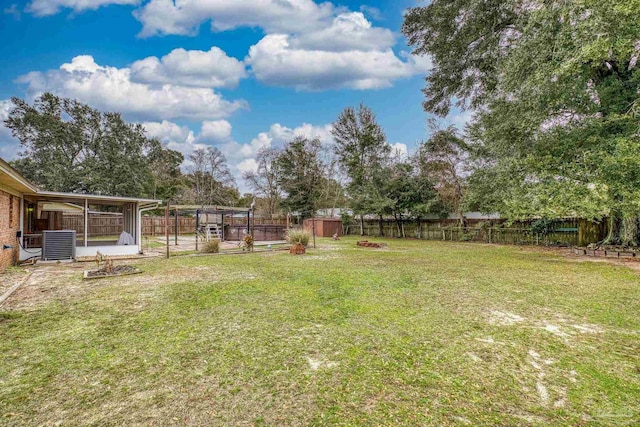 view of yard featuring central AC