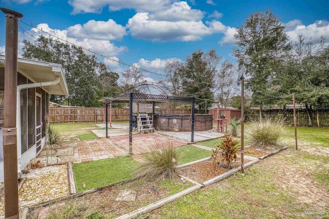 view of yard with a gazebo, a patio area, and a hot tub