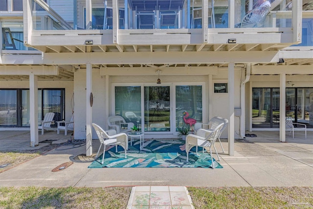 exterior space with a patio and a balcony