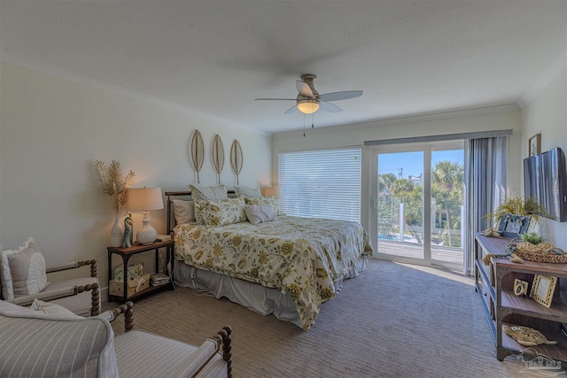 carpeted bedroom with ceiling fan, ornamental molding, and access to exterior