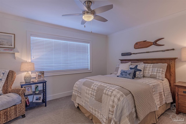 bedroom featuring crown molding, light colored carpet, ceiling fan, and baseboards