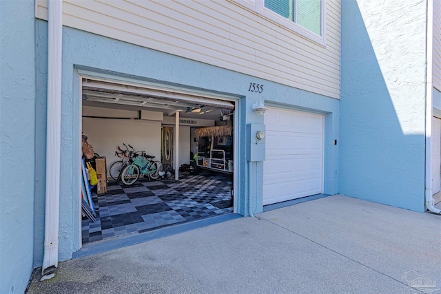 garage with driveway