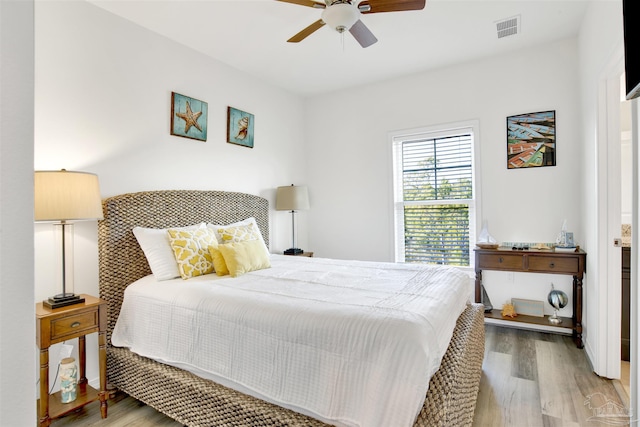 6548 Carlinga Dr, Pensacola, FL 32507 - bedroom featuring light wood finished floors, ceiling fan, and visible vents