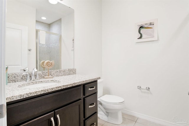 6548 Carlinga Dr, Pensacola, FL 32507 - full bath with baseboards, toilet, a shower stall, vanity, and tile patterned flooring