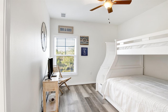 6548 Carlinga Dr, Pensacola, FL 32507 - bedroom featuring light wood-type flooring, ceiling fan, baseboards, and visible vents