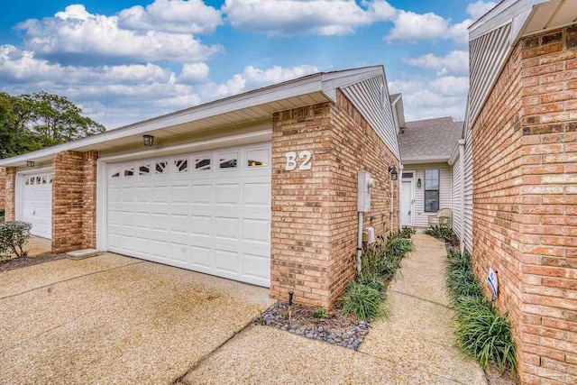 exterior space with a garage