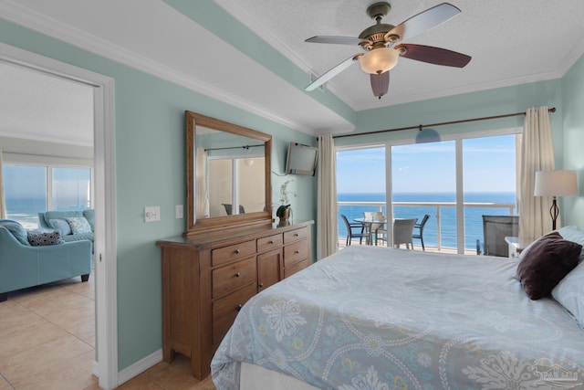 tiled bedroom featuring ornamental molding, ceiling fan, access to outside, and a textured ceiling