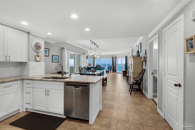 dining space featuring ornamental molding, ceiling fan, and light tile patterned floors