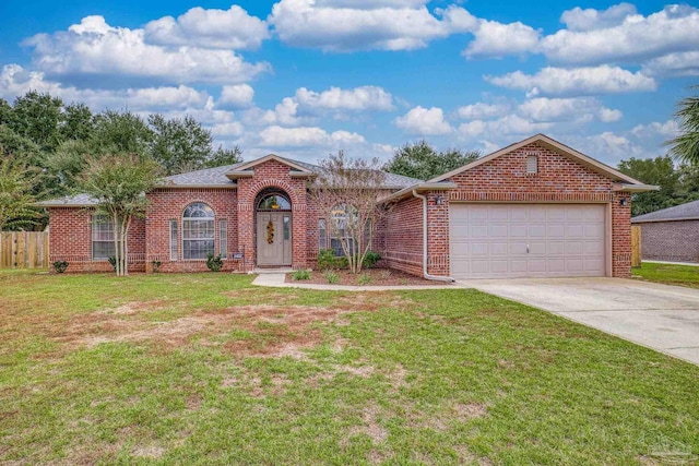 ranch-style house with a front yard and a garage