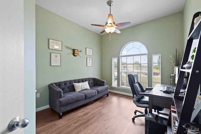 office area with hardwood / wood-style floors and ceiling fan