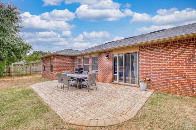 view of patio with a grill