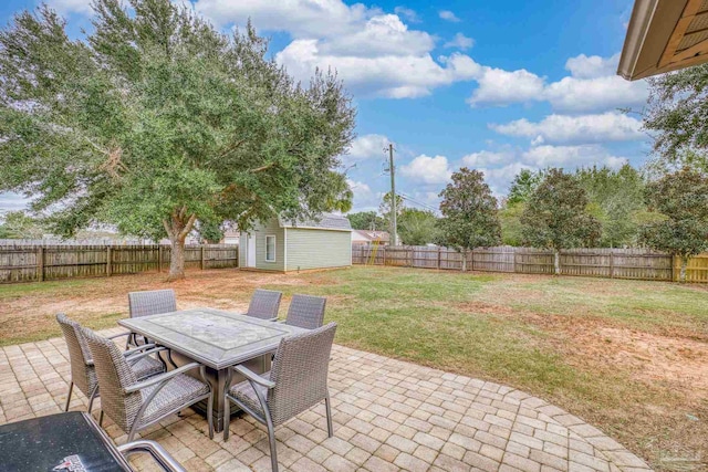 view of patio / terrace featuring a storage shed