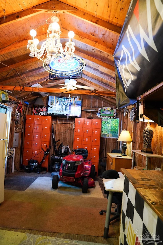 garage with wooden walls and white refrigerator