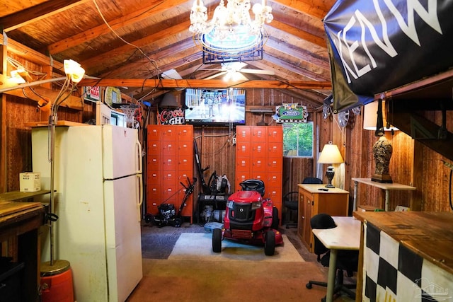 interior space featuring wood walls, white fridge, wooden ceiling, and carpet flooring