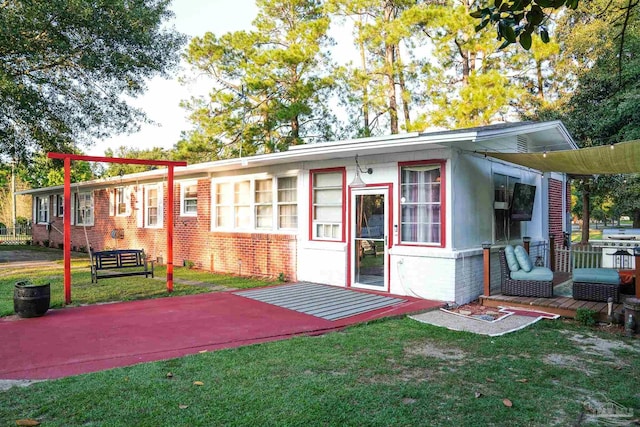 view of outbuilding with a yard