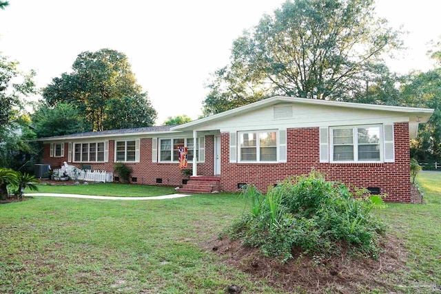 single story home with a front yard and cooling unit