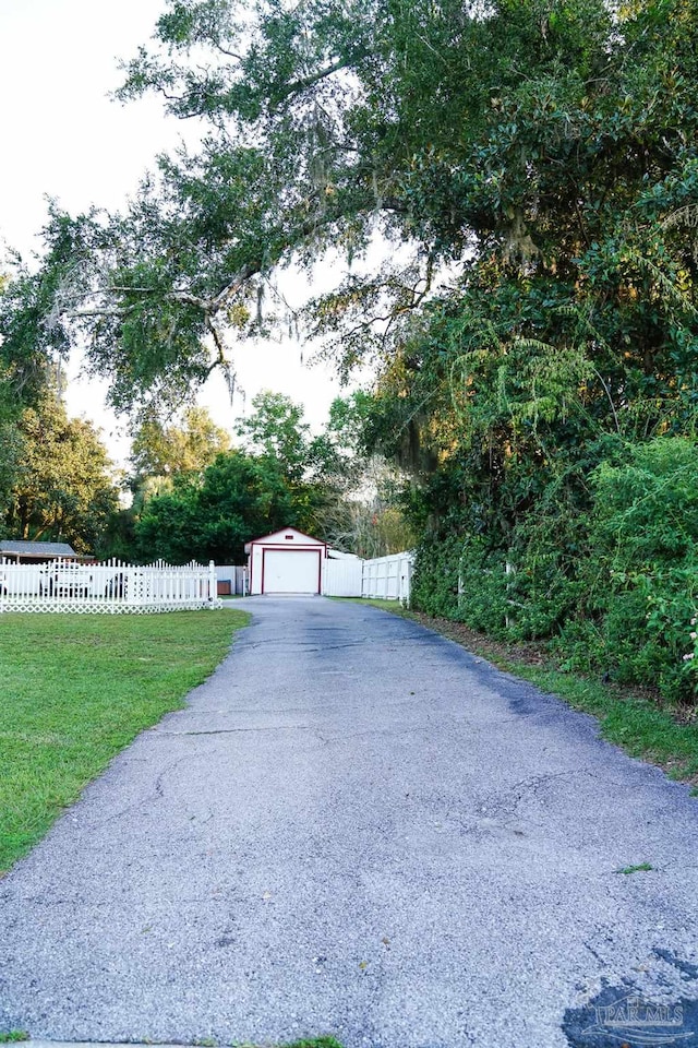 garage with a lawn