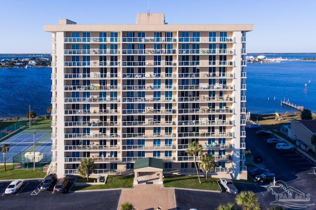 view of property with a water view