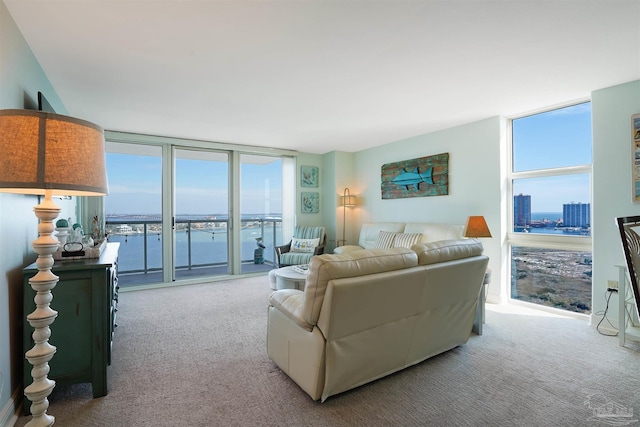 330FORT Pickens Rd Unit 11C, Pensacola Beach, FL 32561 - carpeted living area with a wall of windows, a water view, and a city view