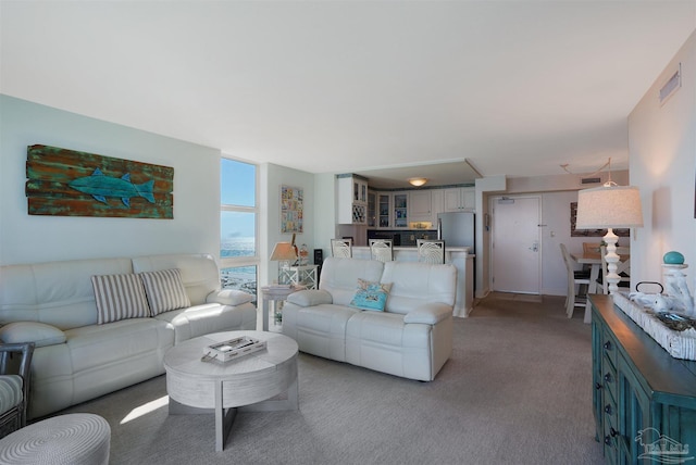 330FORT Pickens Rd Unit 11C, Pensacola Beach, FL 32561 - living area featuring light carpet and visible vents