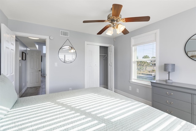 unfurnished bedroom with a closet and ceiling fan