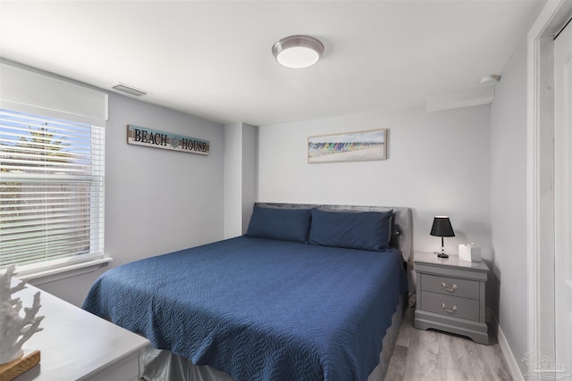 bedroom featuring light hardwood / wood-style flooring