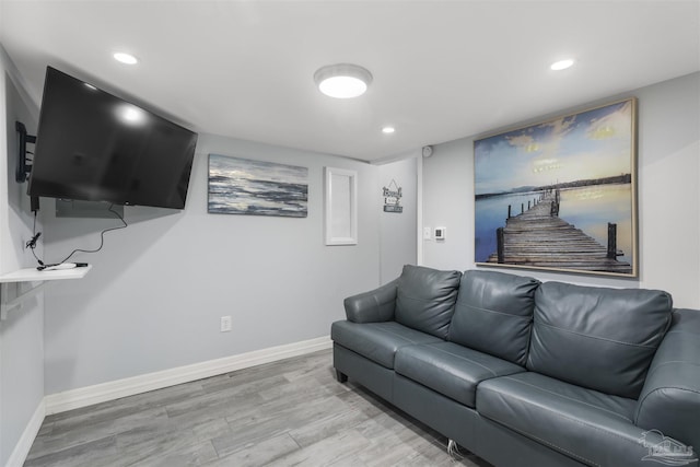 living room with light hardwood / wood-style floors