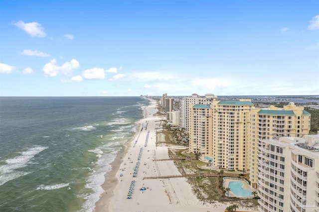 aerial view featuring a water view and a beach view