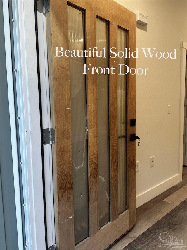 2020 Talbert St, Pensacola, FL 32507 - detailed view of wood finished floors and baseboards