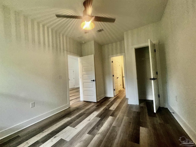 2020 Talbert St, Pensacola, FL 32507 - unfurnished bedroom with wood finished floors, baseboards, and ceiling fan