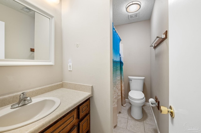 full bathroom featuring visible vents, toilet, vanity, a textured ceiling, and tile patterned flooring