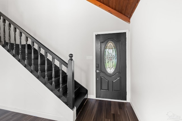 foyer featuring stairway, wood ceiling, baseboards, and wood finished floors