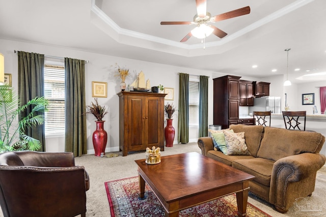 5282 Parkside Dr, Pace, FL 32571 - living area featuring a ceiling fan, a tray ceiling, light colored carpet, recessed lighting, and ornamental molding