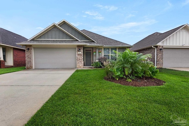 5282 Parkside Dr, Pace, FL 32571 - view of front of property with board and batten siding, brick siding, a garage, a front lawn, and driveway