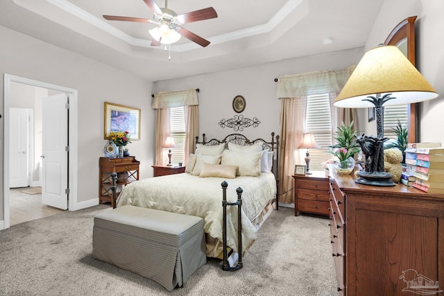5282 Parkside Dr, Pace, FL 32571 - bedroom featuring light colored carpet, a tray ceiling, a ceiling fan, and ornamental molding