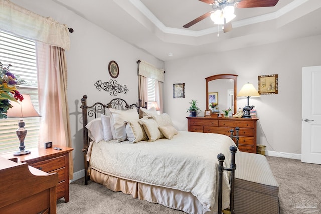 5282 Parkside Dr, Pace, FL 32571 - bedroom featuring light carpet, a tray ceiling, a ceiling fan, and crown molding