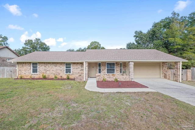 ranch-style home with a front yard and a garage