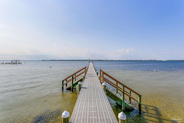 view of dock with a water view