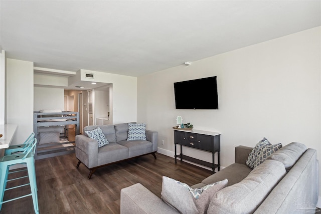 living room featuring dark hardwood / wood-style floors