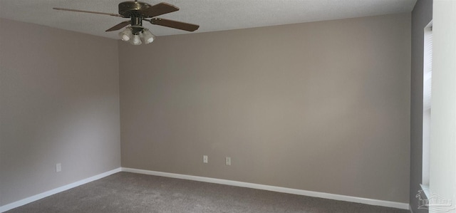 empty room featuring carpet and ceiling fan