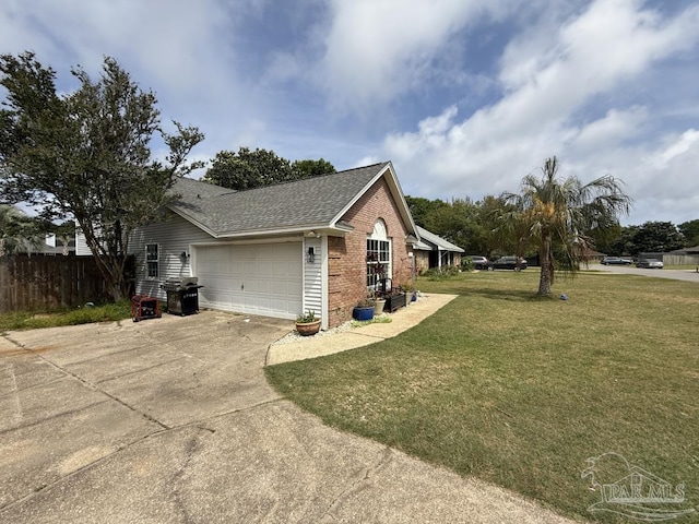 1515 Mariners Cir, Gulf Breeze, FL 32563 - view of side of home featuring brick siding, roof with shingles, concrete driveway, and an attached garage